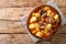 BonavaÂ Mauritanian Lamb stew with potatoes in hot sauce close-up in a bowl. Horizontal top view